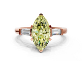 Rose gold Fancy Yellow Marquise  Cut Diamond Solitaire Ring with Tapered Baguette Accents and Four-Prong Setting