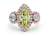Rose gold Fancy Yellow Marquise Cut Diamond Three-Stone Halo Ring with Prong Setting and Pavé Accents