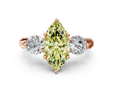 Rose gold Fancy Yellow Marquise Cut Diamond Three-Stone Ring with Prong Setting and Pavé Band