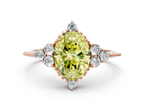 Rose gold Fancy Yellow Oval Cut Brilliant Diamond with Cluster Setting on a Beaded Band and Four-Prong Setting