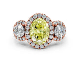 Rose gold Fancy Yellow Oval Cut Diamond Three-Stone Halo Ring with Prong Setting and Pavé Accents