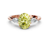 Rose gold Fancy Yellow Oval Cut Diamond Three-Stone Ring with Pear Side Stones and Four-Prong Setting_60