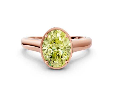 Rose gold Fancy Yellow Oval Cut Solitaire Diamond Engagement Ring with Four-Prong Setting and Tapered Band