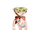 Rose gold Fancy Yellow Oval  Cut Solitaire Diamond with Side Stones on Criss-Cross Band and Four-Prong Setting_8