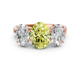 Rose gold Fancy Yellow Oval Cut Three-Stone Diamond Ring with Prong Setting on a Classic Band_12