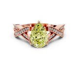 Rose gold Fancy Yellow Pear Cut Cut Diamond Twisted Band with Milgrain Pave Setting and Four-Prong Setting