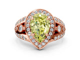Rose gold Fancy Yellow Pear Cut Diamond Halo Ring with Split Shank and Bezel Accents and Four-Prong Setting