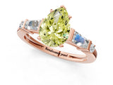Rose gold Fancy Yellow Pear  Cut Diamond Ring with Baguette Side Stones, Channel Set Band, and Four-Prong Setting_25