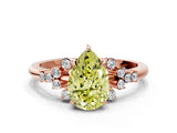 Rose gold Fancy Yellow Pear Cut Diamond Ring with Side Stones and Four-Prong Setting_116
