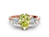 Rose gold Fancy Yellow Pear Cut Diamond Three-Stone Engagement Ring with Prong Setting and Pavé Band