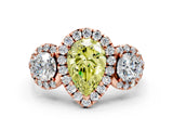 Rose gold Fancy Yellow Pear Cut Diamond Three-Stone Halo Ring with Prong Setting and Pavé Accents