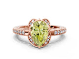 Rose gold Fancy Yellow Pear  Cut Halo Diamond Ring with Channel Set Band and Four-Prong Setting_32