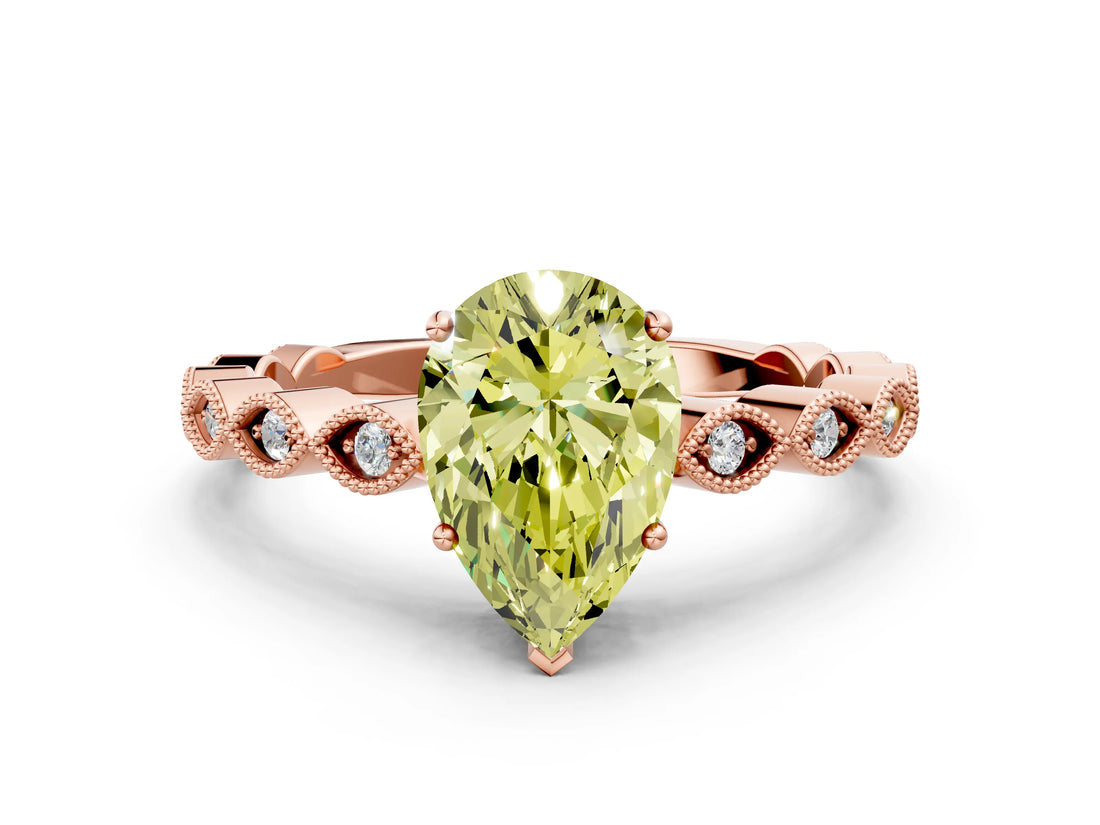 Rose gold Fancy Yellow Pear Cut Solitaire Diamond Ring with Infinity Twist Band and Four-Prong Setting