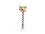 Rose gold Fancy Yellow Pear Cut Solitaire Diamond Ring with Infinity Twist Band and Four-Prong Setting_2