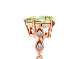 Rose gold Fancy Yellow Pear Cut Solitaire Diamond Ring with Infinity Twist Band and Four-Prong Setting_5