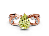 Rose gold Fancy Yellow Pear  Cut Solitaire Diamond with Side Stones on Criss-Cross Band and Four-Prong Setting_3