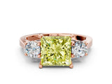 Rose gold Fancy Yellow Princess Cut Diamond Three-Stone Engagement Ring with Prong Setting and Pavé Band