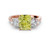 Rose gold Fancy Yellow Radiant Cut Diamond Three-Stone Engagement Ring with Prong Setting and Pavé Band