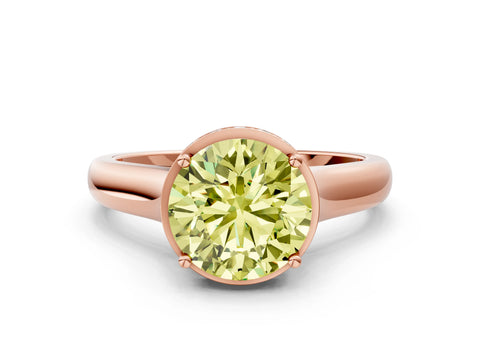 Rose gold Fancy Yellow Round Cut Solitaire Diamond Engagement Ring with Four-Prong Setting and Tapered Band