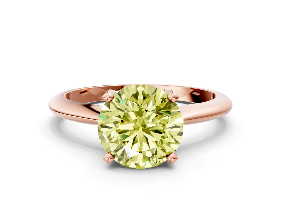 Rose gold Fancy Yellow Round  Cut Solitaire Ring with Four-Prong Setting on a Classic Band
