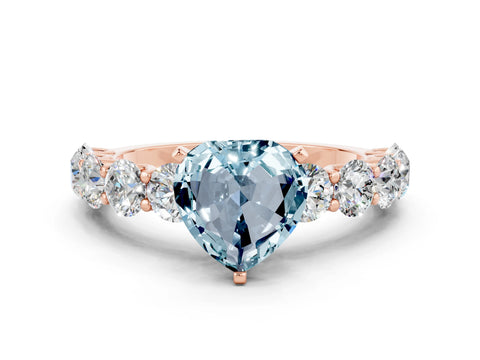 Rose gold Heart Cut Aquamarine Prong Setting with Side Stones on a Pave Band