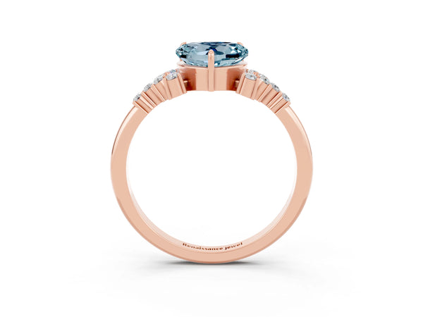 Rose gold Heart Cut Aquamarine Ring with Side Stones and Four-Prong Setting