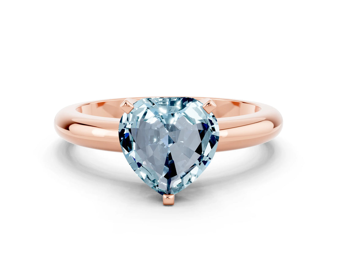 Rose gold Heart Cut Aquamarine Solitaire Engagement Ring with Round Band and Four-Prong Setting