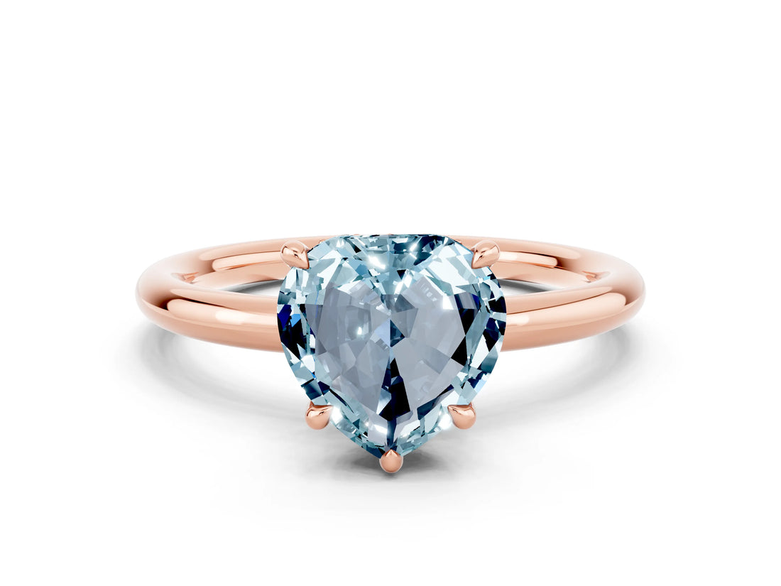 Rose gold Heart Cut Aquamarine Solitaire Ring with Thin Band and Four-Prong Setting