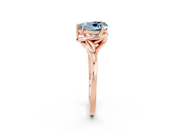 Rose gold Heart Cut Aquamarine Solitaire Ring with Twist Band and Four-Prong Setting