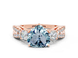 Rose gold Heart Cut Aquamarine Three-Stone Ring with Pavé Split Shank and Four-Prong Setting