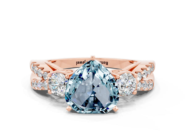 Rose gold Heart Cut Aquamarine Three-Stone Ring with Pavé Split Shank and Four-Prong Setting