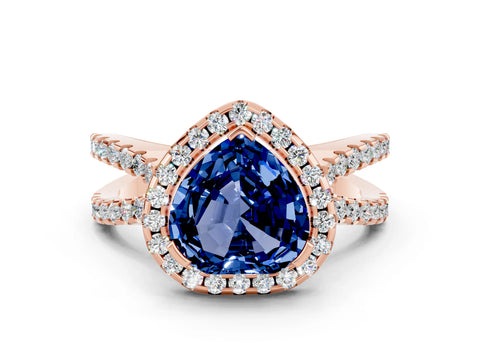 Rose gold Heart Cut Blue Sapphire Halo Ring with Split Shank Pavé Band and Prong Setting