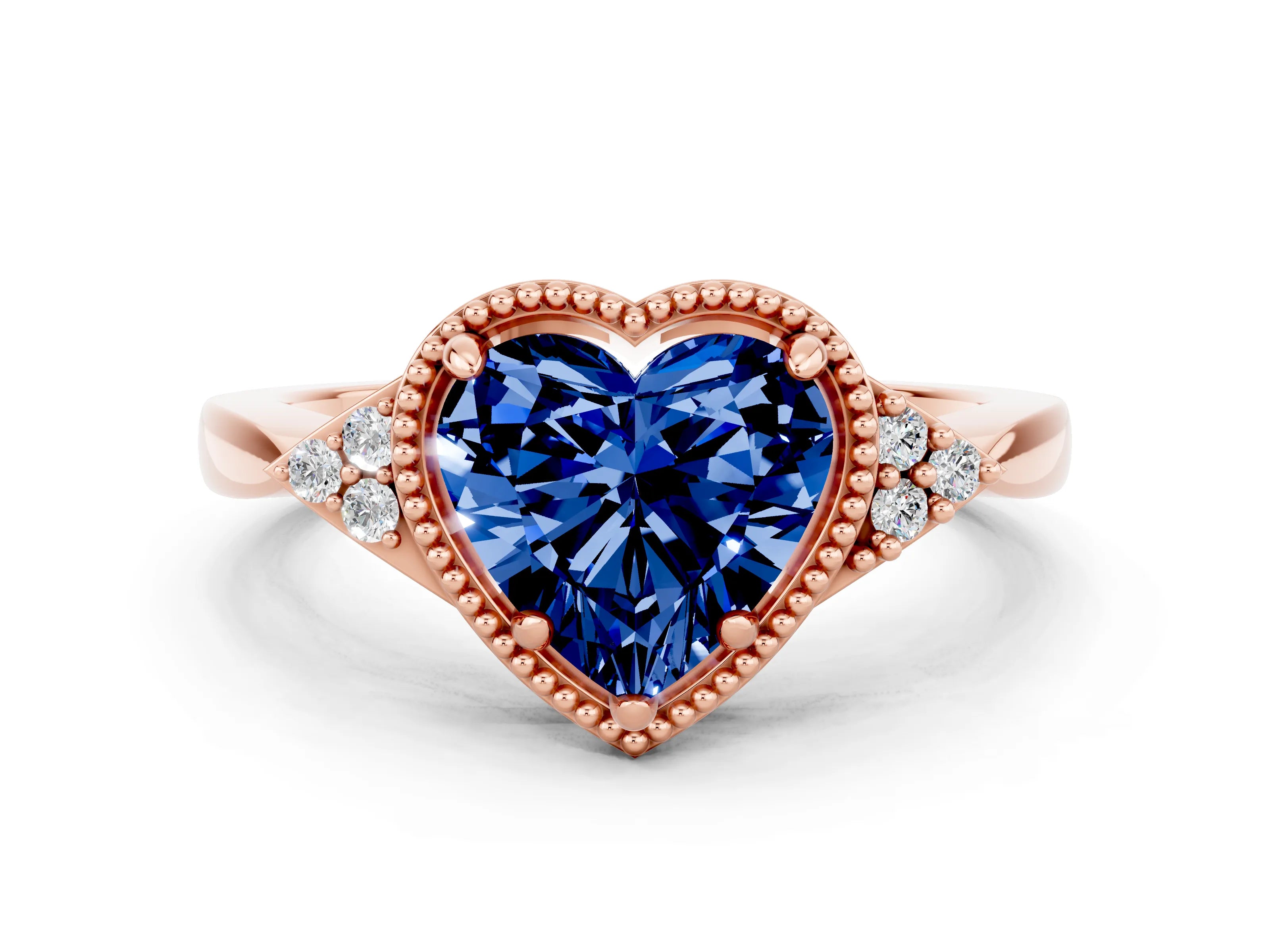 Rose gold Heart Cut Blue Sapphire Halo Ring with Tapered Band and Four-Prong Setting