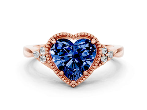 Rose gold Heart Cut Blue Sapphire Halo Ring with Tapered Band and Four-Prong Setting