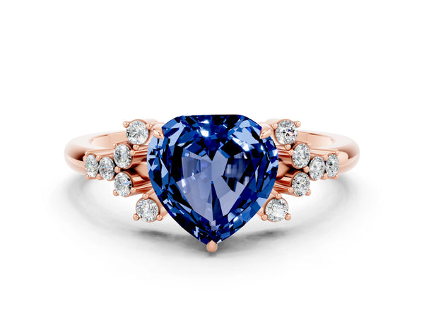 Rose gold Heart Cut Blue Sapphire Ring with Side Stones and Four-Prong Setting