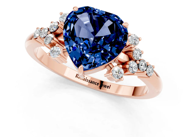 Rose gold Heart Cut Blue Sapphire Ring with Side Stones and Four-Prong Setting