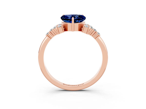 Rose gold Heart Cut Blue Sapphire Ring with Side Stones and Four-Prong Setting