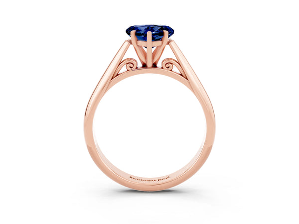 Rose gold Heart Cut Blue Sapphire Solitaire Engagement Ring with Cathedral Setting and Four-Prong Mount