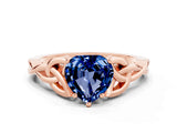 Rose gold Heart Cut Blue Sapphire Solitaire Engagement Ring with Celtic Knot Band and Four-Prong Setting