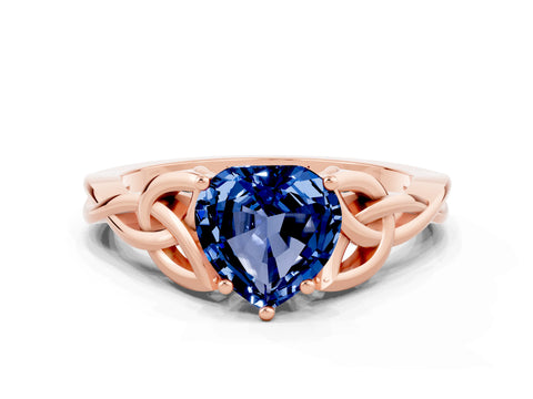 Rose gold Heart Cut Blue Sapphire Solitaire Engagement Ring with Celtic Knot Band and Four-Prong Setting