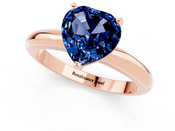 Rose gold Heart Cut Blue Sapphire Solitaire Engagement Ring with Round Band and Four-Prong Setting