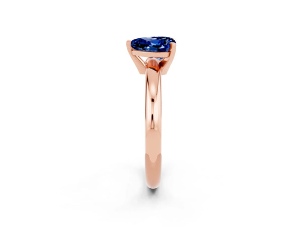 Rose gold Heart Cut Blue Sapphire Solitaire Engagement Ring with Round Band and Four-Prong Setting