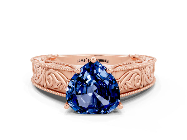 Rose gold Heart Cut Blue Sapphire Solitaire Ring with Engraved Band and Four-Prong Setting