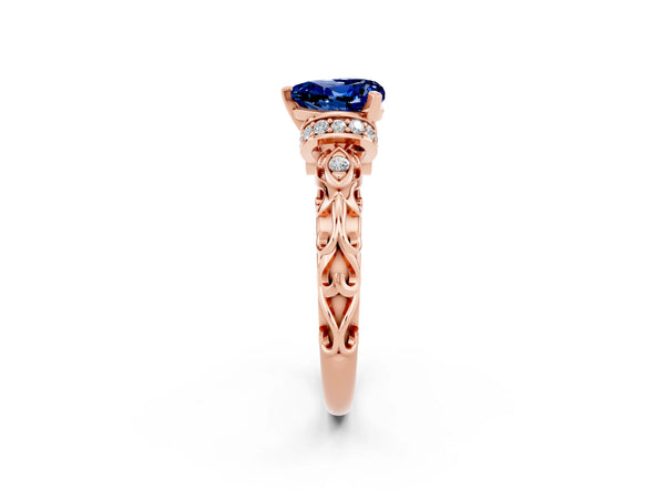 Rose gold Heart Cut Blue Sapphire Solitaire Ring with Filigree Band and Four-Prong Setting