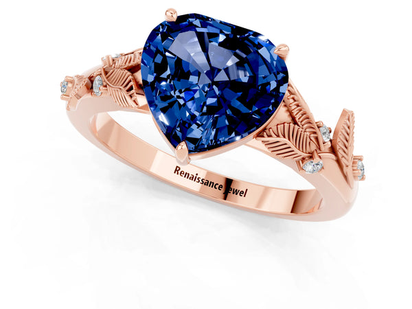 Rose gold Heart Cut Blue Sapphire Solitaire Ring with Leaf Motif Band and Four-Prong Setting