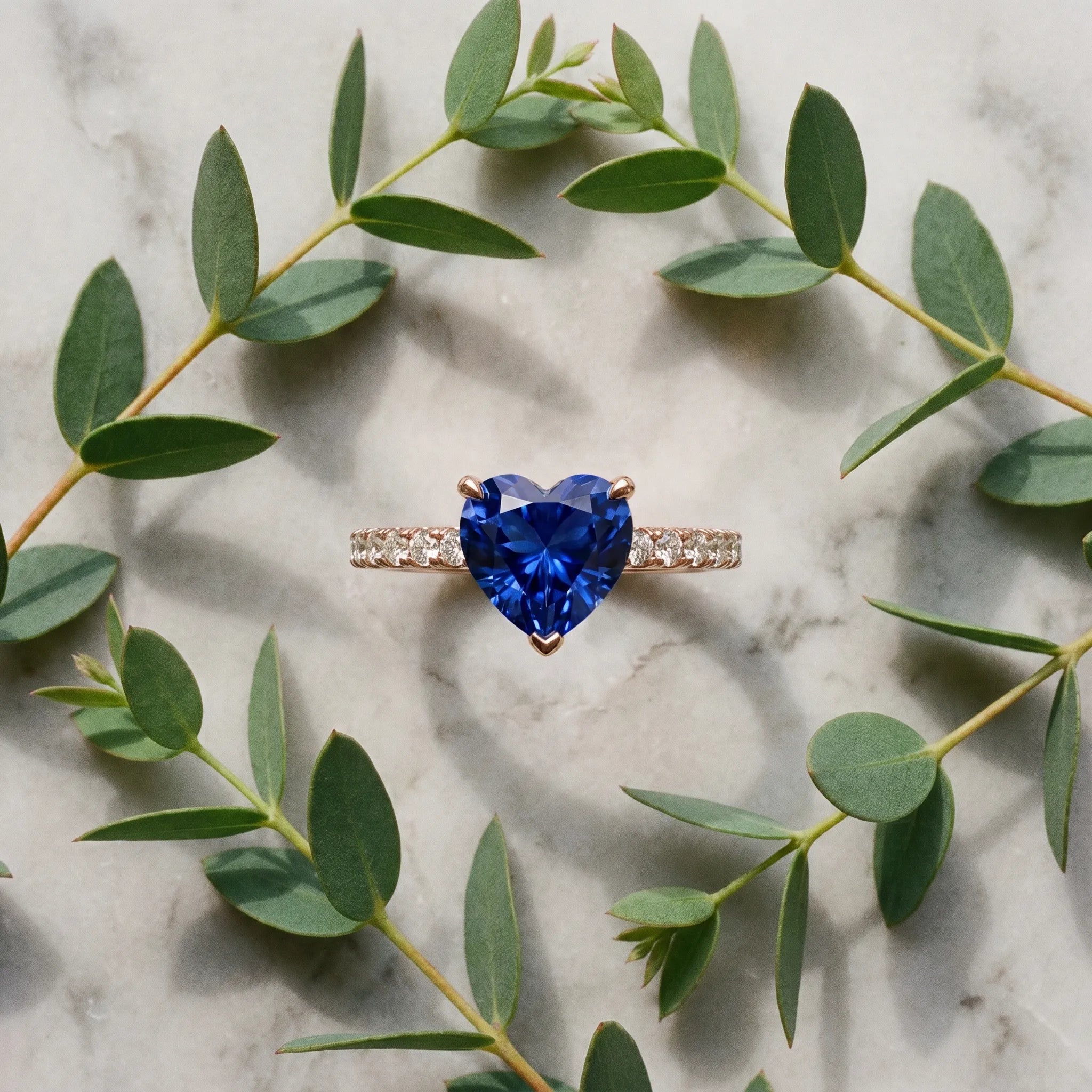 Rose gold Heart Cut Blue Sapphire Solitaire Ring with Round  Pavé Band and Four-Prong Setting_45