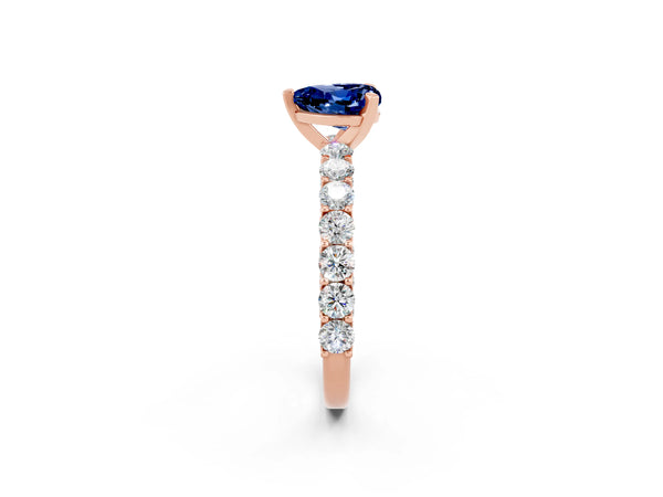 Rose gold Heart Cut Blue Sapphire Solitaire Ring with Shared Prong Pavé Band and Four-Prong Setting
