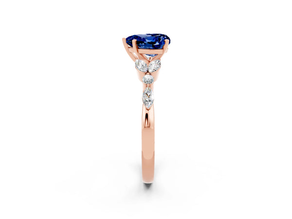 Rose gold Heart Cut Blue Sapphire Solitaire Ring with Side Stones and Four-Prong Setting