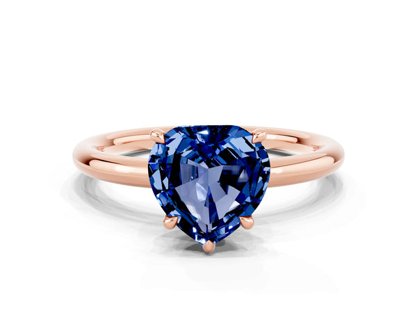 Rose gold Heart Cut Blue Sapphire Solitaire Ring with Thin Band and Four-Prong Setting