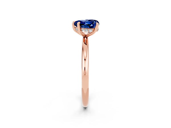 Rose gold Heart Cut Blue Sapphire Solitaire Ring with Thin Band and Four-Prong Setting